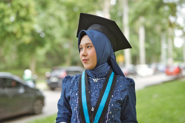 Portrait of a smiling young woman student wearing a headscarf