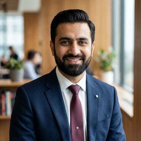 Portrait of the founder of Destiny Visa in a formal shirt